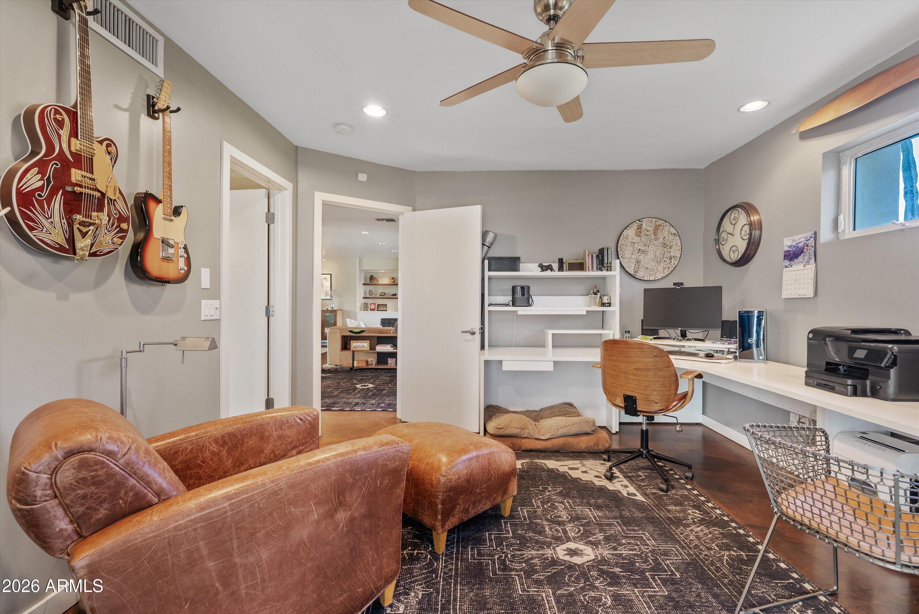 2933 East Pierson Street Phoenix, AZ 85016 - Photo 23 of 28 a living room with furniture and a window