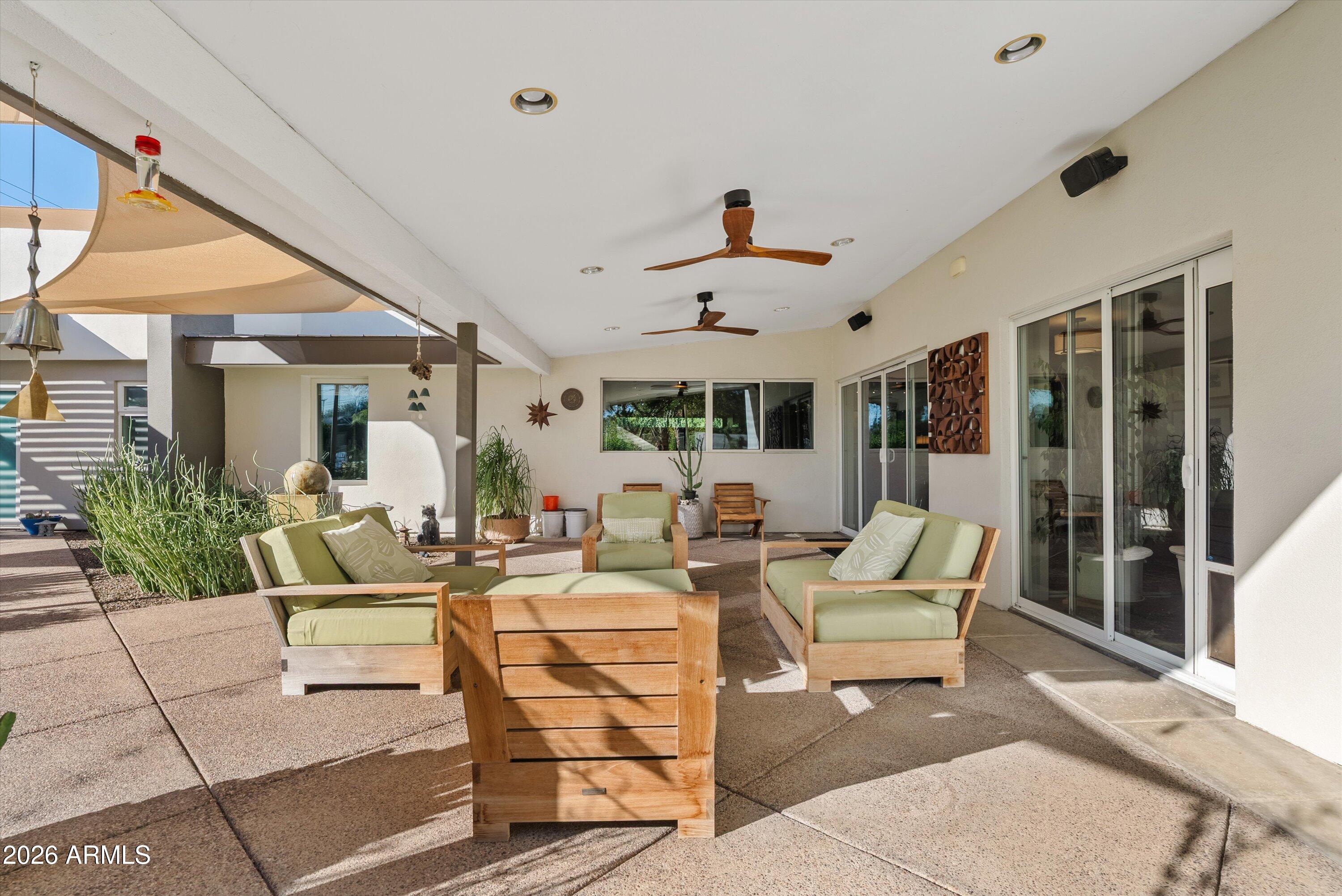2933 East Pierson Street Phoenix, AZ 85016 - Photo 25 of 28 a living room with patio furniture and a large window