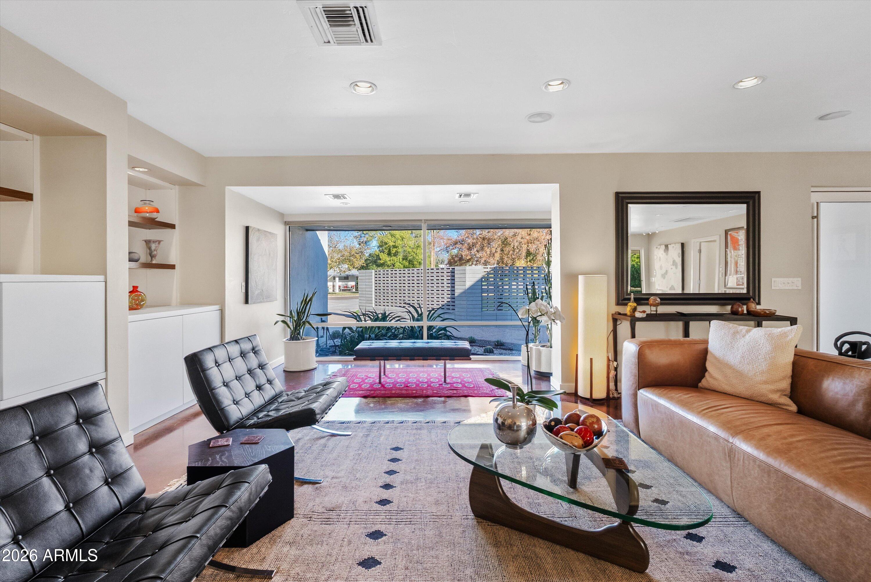 2933 East Pierson Street Phoenix, AZ 85016 - Photo 4 of 28 a living room with furniture or couch and a large window