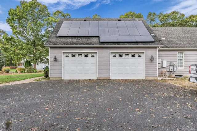 a house view with a garden space