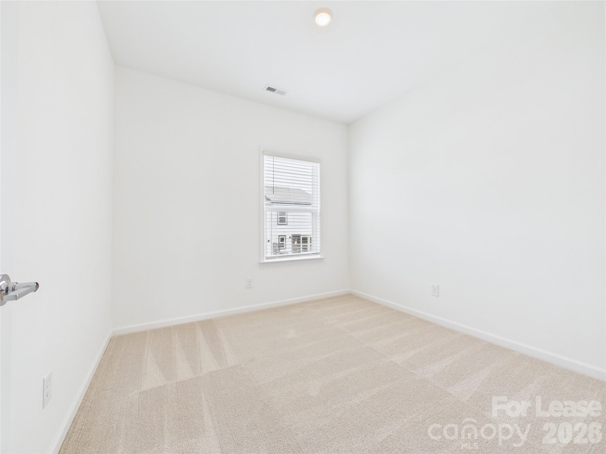 3013 Rexton Lane Charlotte, NC 28262 - Photo 17 of 27 a view of an empty room