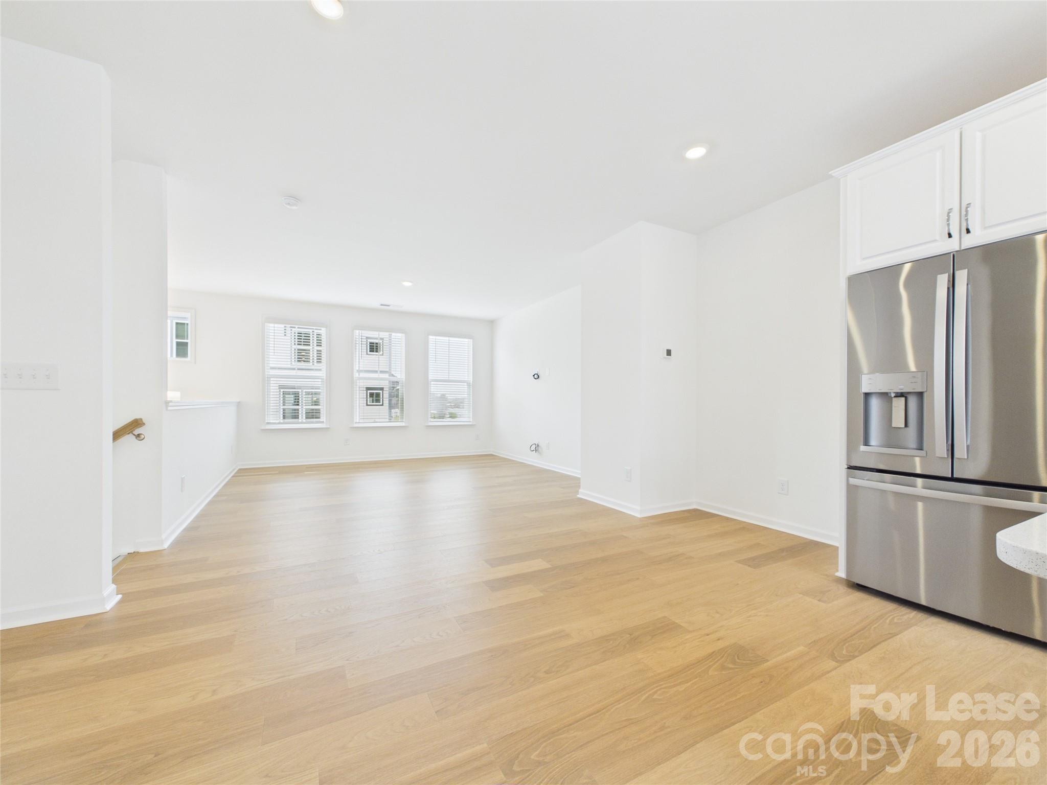 3013 Rexton Lane Charlotte, NC 28262 - Photo 7 of 27 a view of an empty room with a window