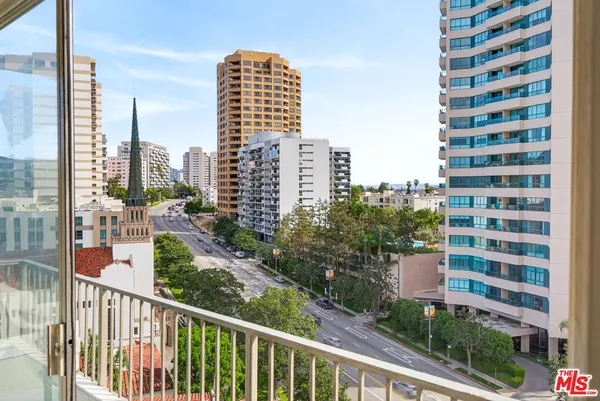 a view of a city with tall buildings