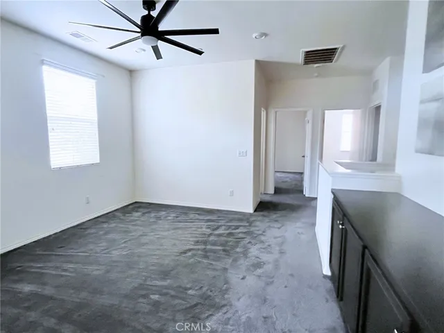 a view of a kitchen cabinets and a stove top oven