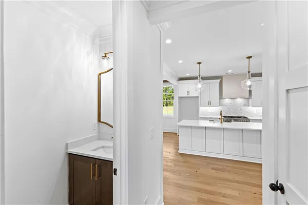 a view of kitchen with wooden floor
