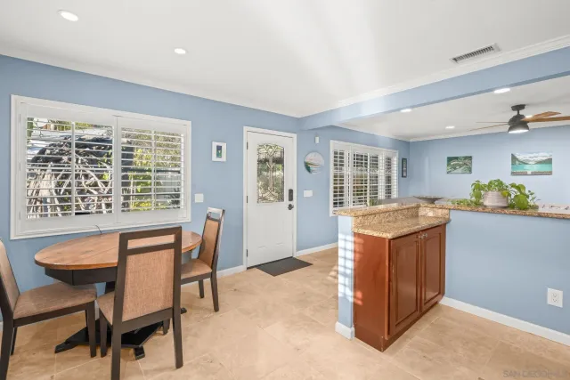 a workspace with furniture and a window