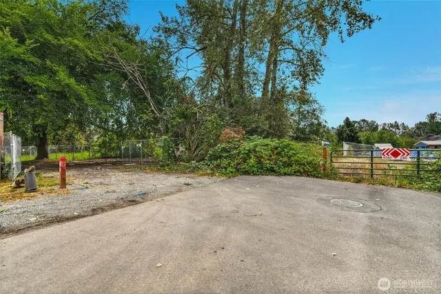 a view of road with houses