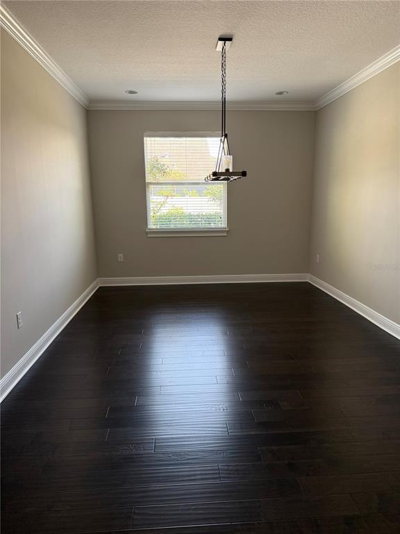 2894 Sand Oak Loop Apopka, FL 32712 - Photo 24 of 69 a view of an empty room with wooden floor and a window