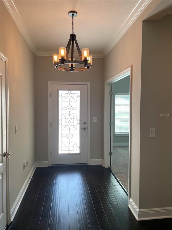 2894 Sand Oak Loop Apopka, FL 32712 - Photo 30 of 69 a view of empty room with wooden floor and fan