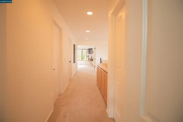a hallway with a wooden floor