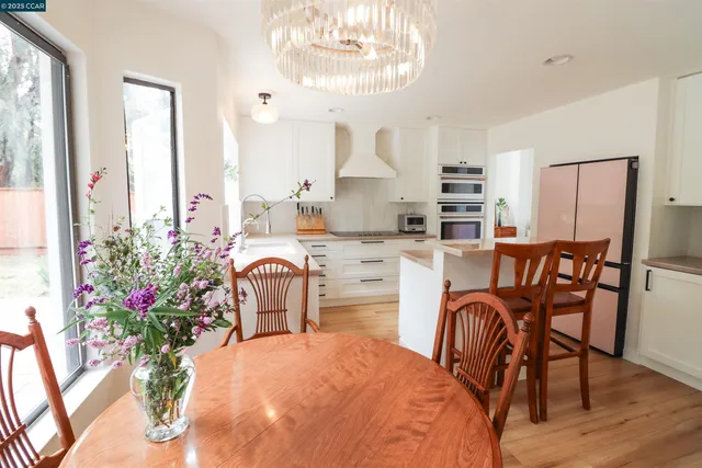 a bathroom with a double vanity sink and mirror