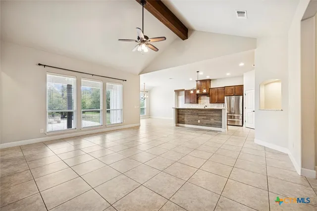 a view of a electric appliances and chandelier in a room