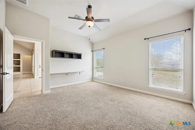 a bathroom with a tub and shower