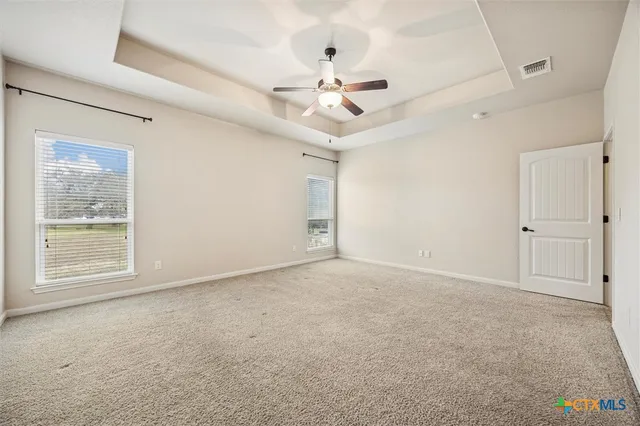 a view of a garden and lake