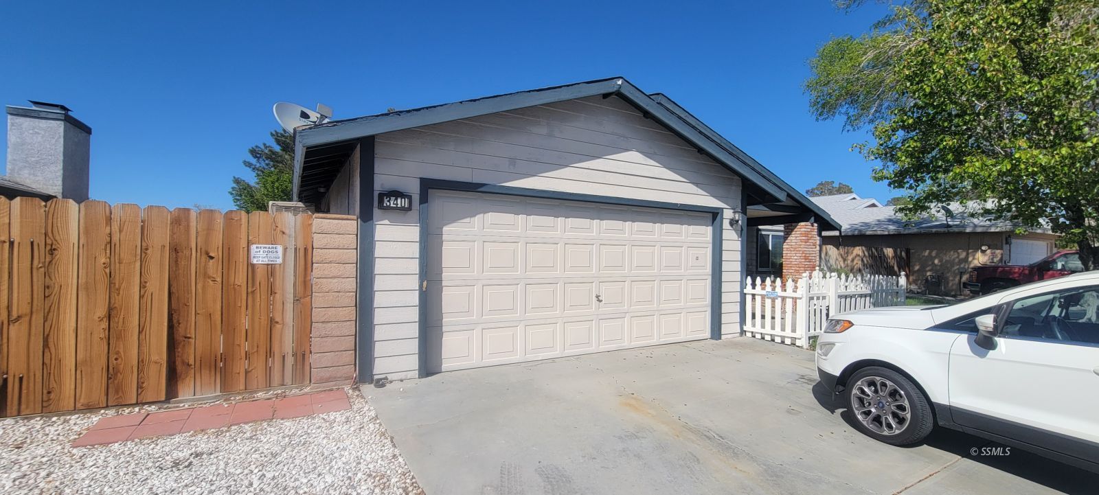340 East Upjohn Avenue Ridgecrest, CA 93555 - Photo 2 of 31 a car parked in front of a house