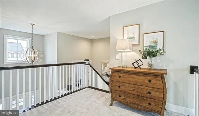 a view of a hallway with windows