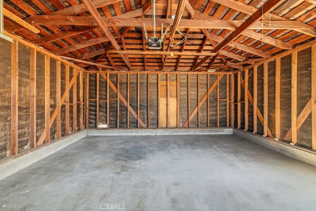 a view of an empty room with a garage