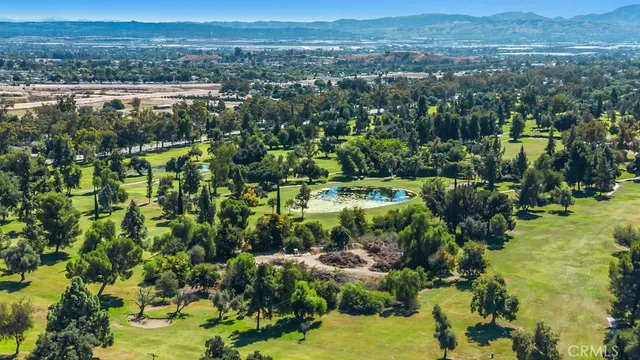a view of a town with mountains in the background