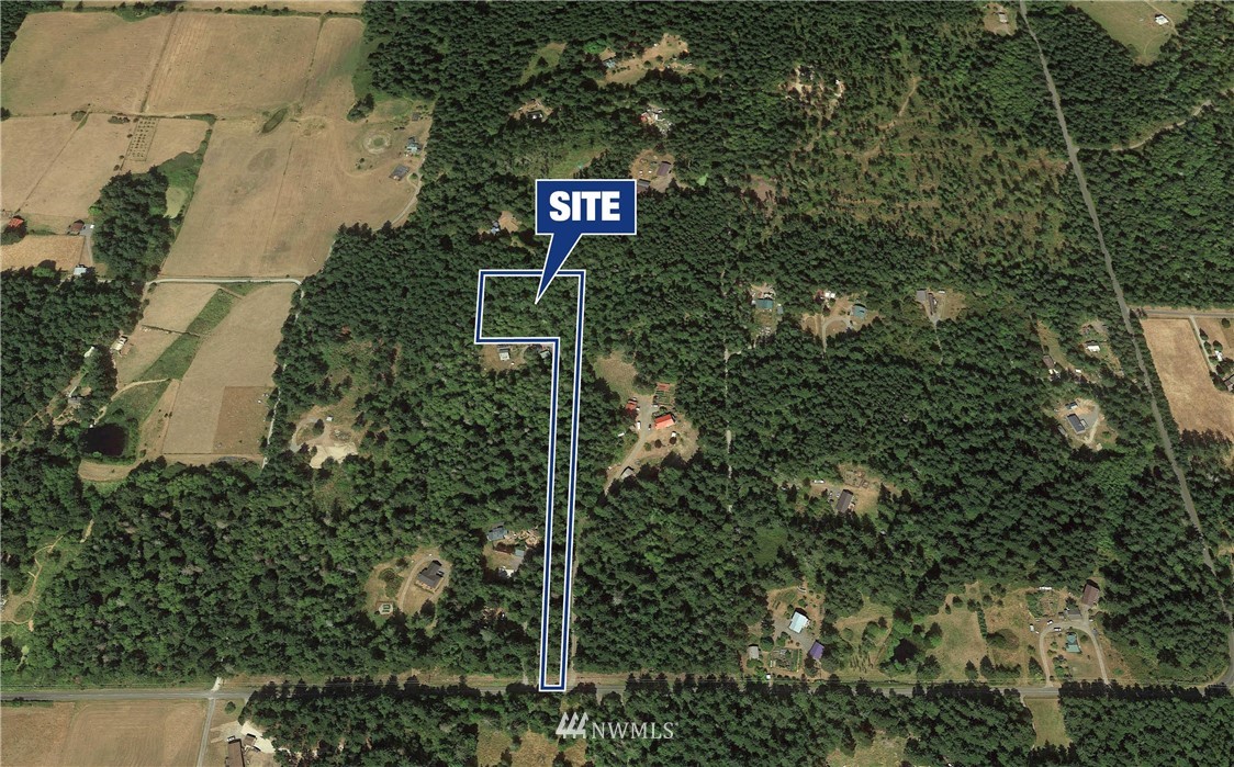 0 School Road Lopez Island, WA 98261 - Photo 1 of 11 a sign that is on the side of a road