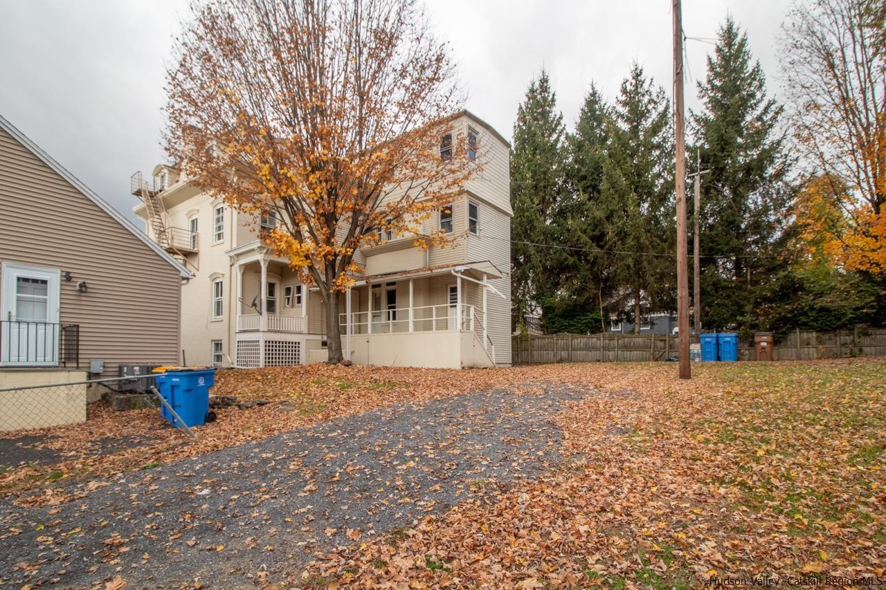 Undisclosed Address Kingston, NY 12401 - Photo 13 of 33 a front view of house with yard and trees