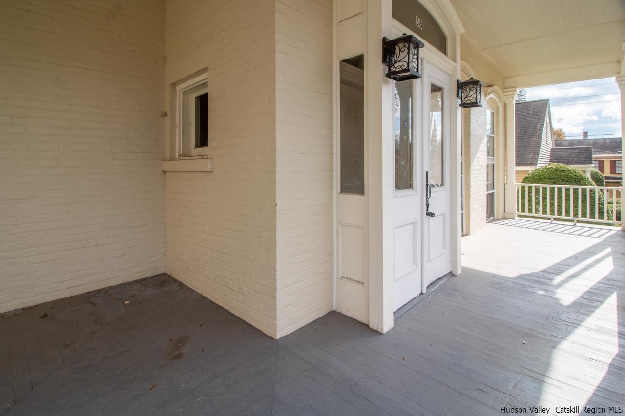 Undisclosed Address Kingston, NY 12401 - Photo 17 of 33 a view of a room with wooden floor and windows