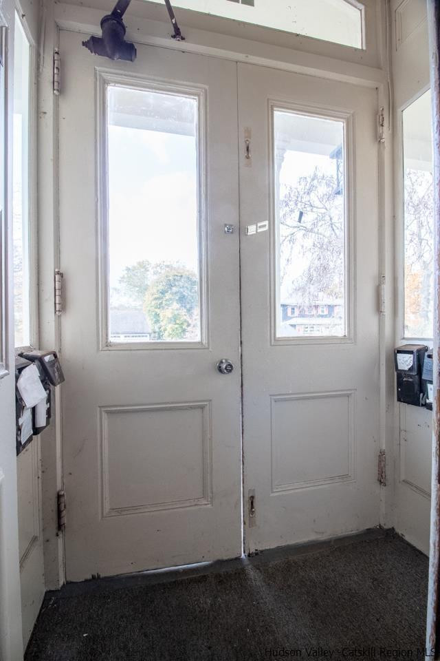 Undisclosed Address Kingston, NY 12401 - Photo 19 of 33 an empty room with windows