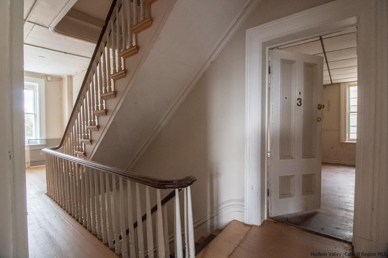 Undisclosed Address Kingston, NY 12401 - Photo 23 of 33 a view of staircase with wooden floor and stairs