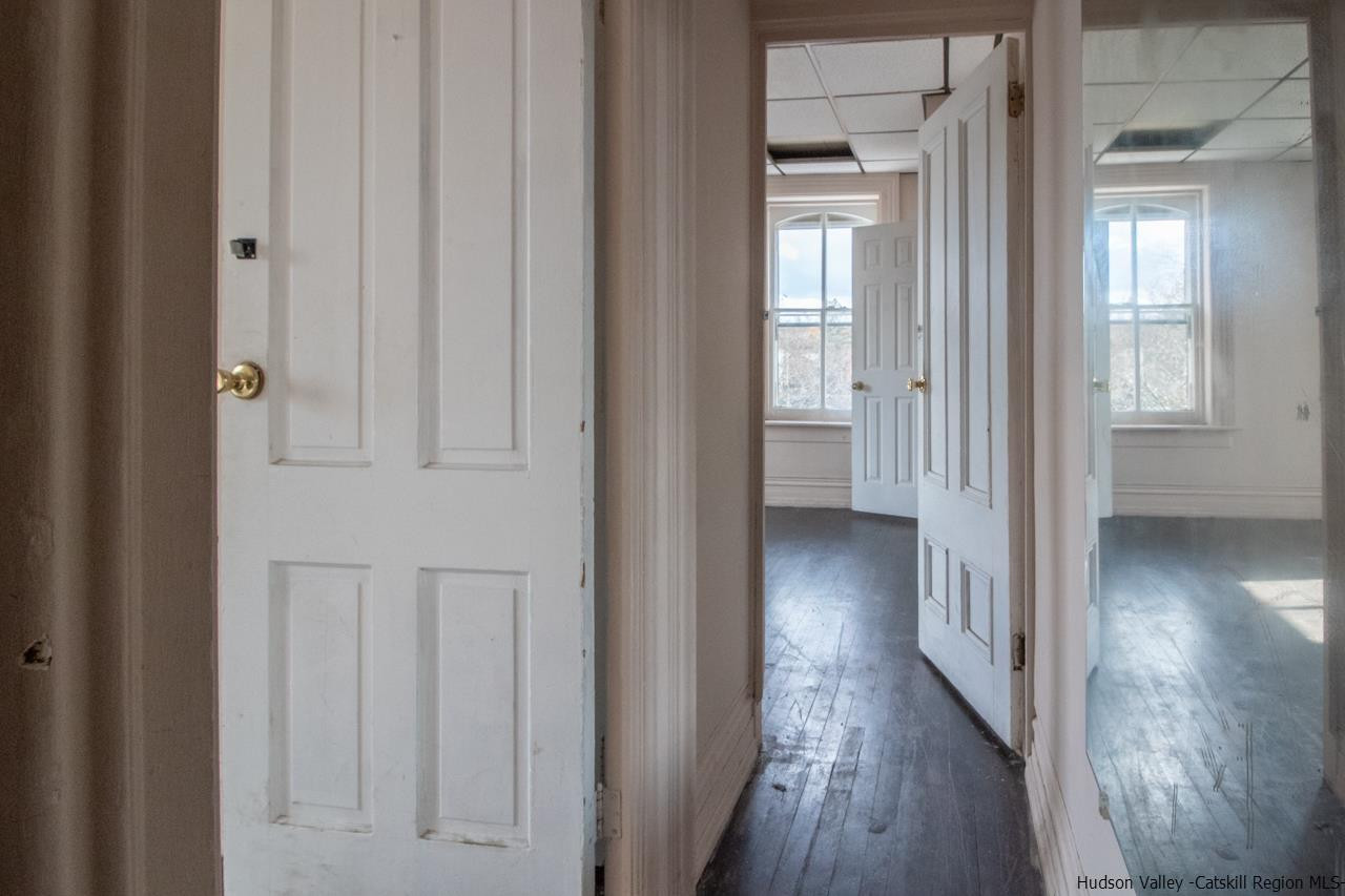 Undisclosed Address Kingston, NY 12401 - Photo 26 of 33 a view of a hallway with wooden floor