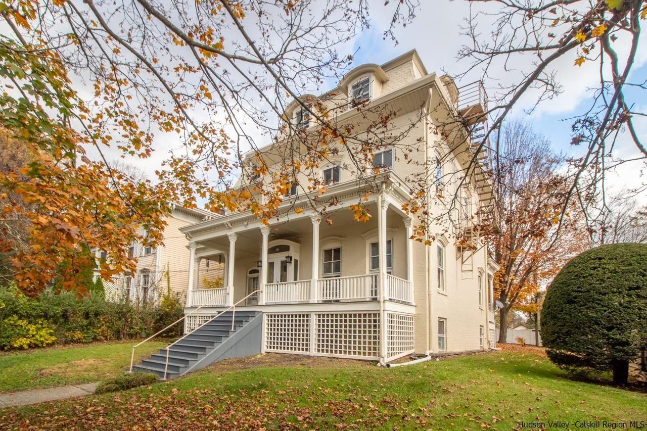 Undisclosed Address Kingston, NY 12401 - Photo 3 of 33 front view of a house with a yard