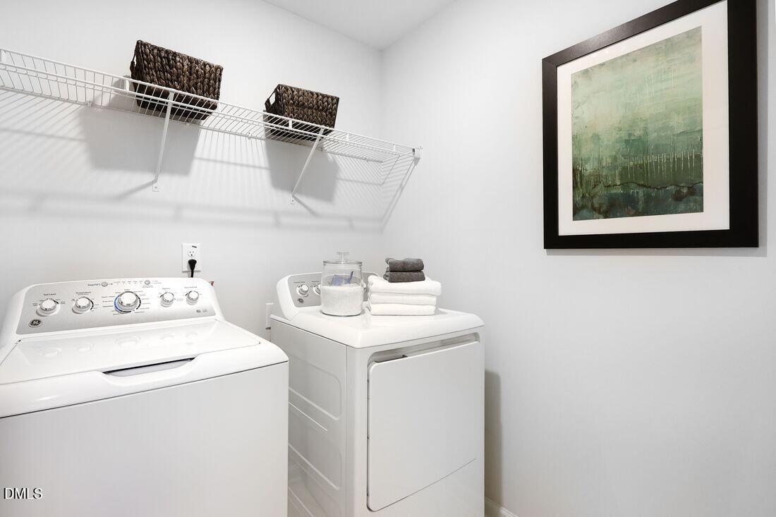 1324 West Garner Road, Unit 100 Garner, NC 27529 - Photo 26 of 34 a utility room with dryer and washer