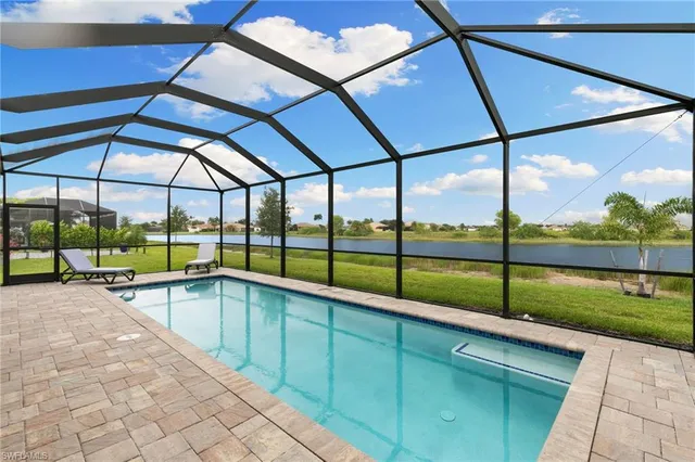 a view of outdoor space with swimming pool