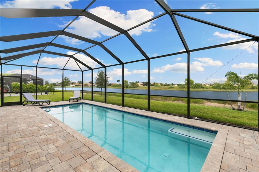 1473 Birdie Drive Naples, FL 34120 - Photo 30 of 50 a view of outdoor space with swimming pool