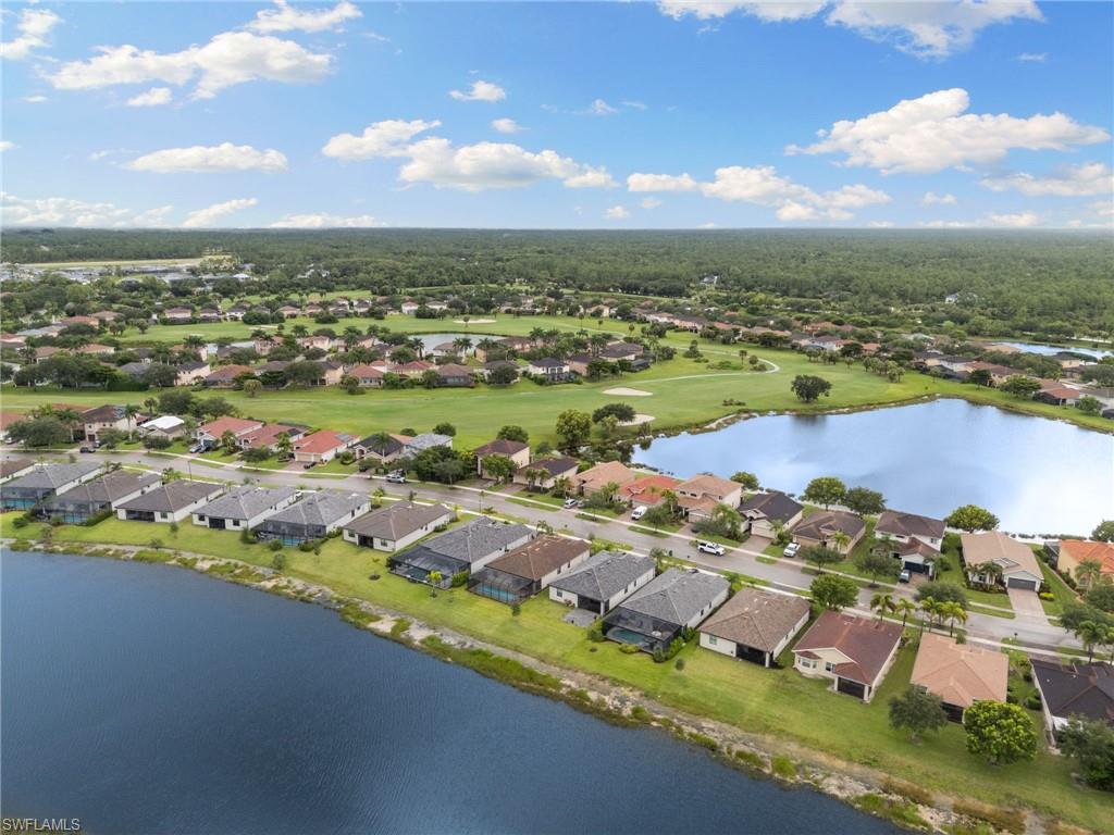 1473 Birdie Drive Naples, FL 34120 - Photo 37 of 50 an aerial view of residential houses with outdoor space