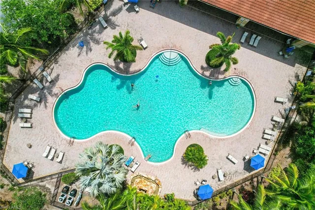 an aerial view of a swimming pool