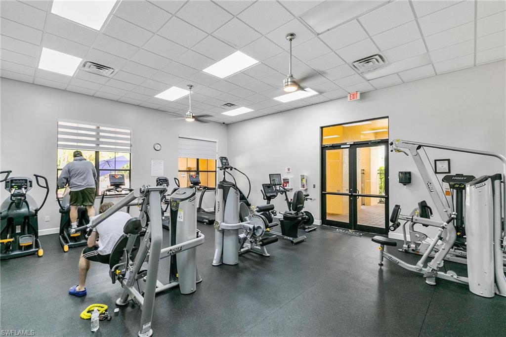 1473 Birdie Drive Naples, FL 34120 - Photo 47 of 50 a view of a room with gym equipment