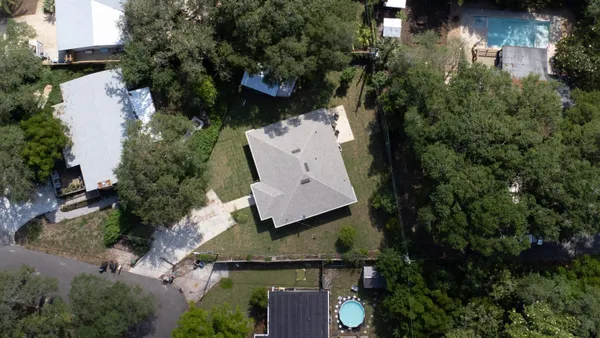 a view of a wooden floor and a lake view