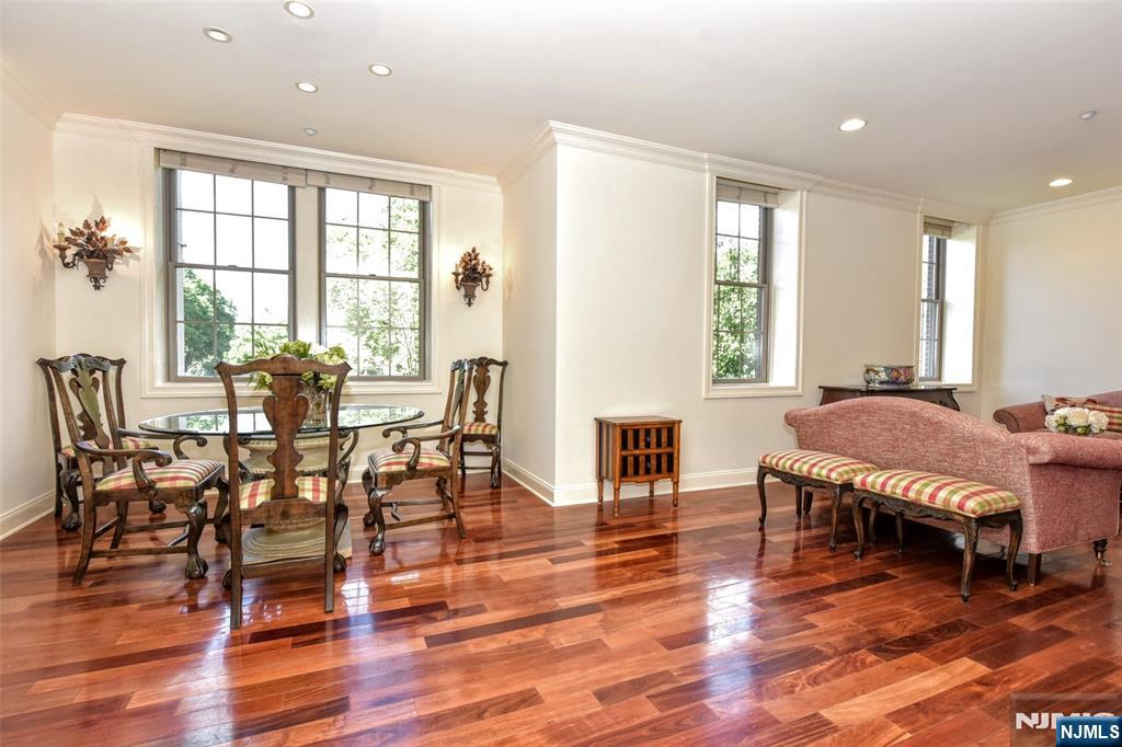 4201 Rio Vista Drive, Unit 4201 Mahwah, NJ 07430 - Photo 5 of 34 a view of a dining room with furniture and wooden floor