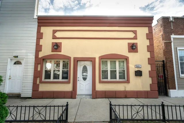 a front view of a house with a porch