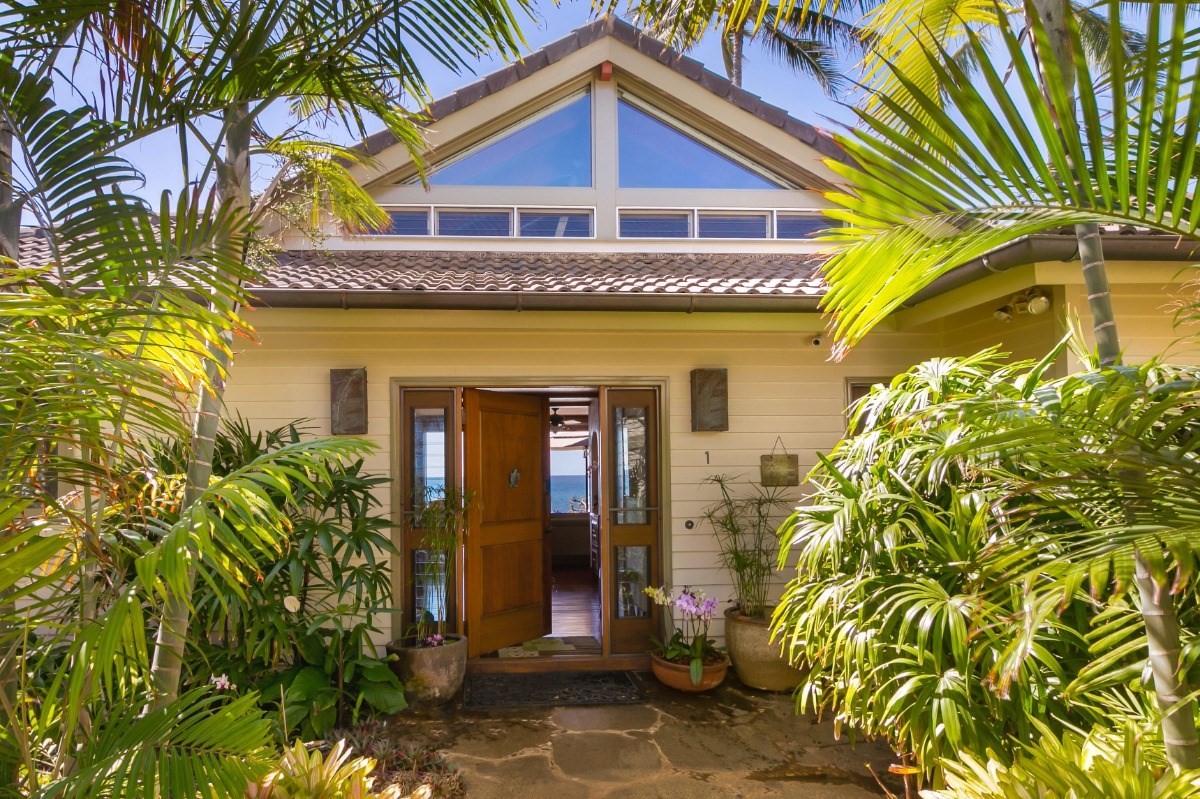 a view of a house with a small garden