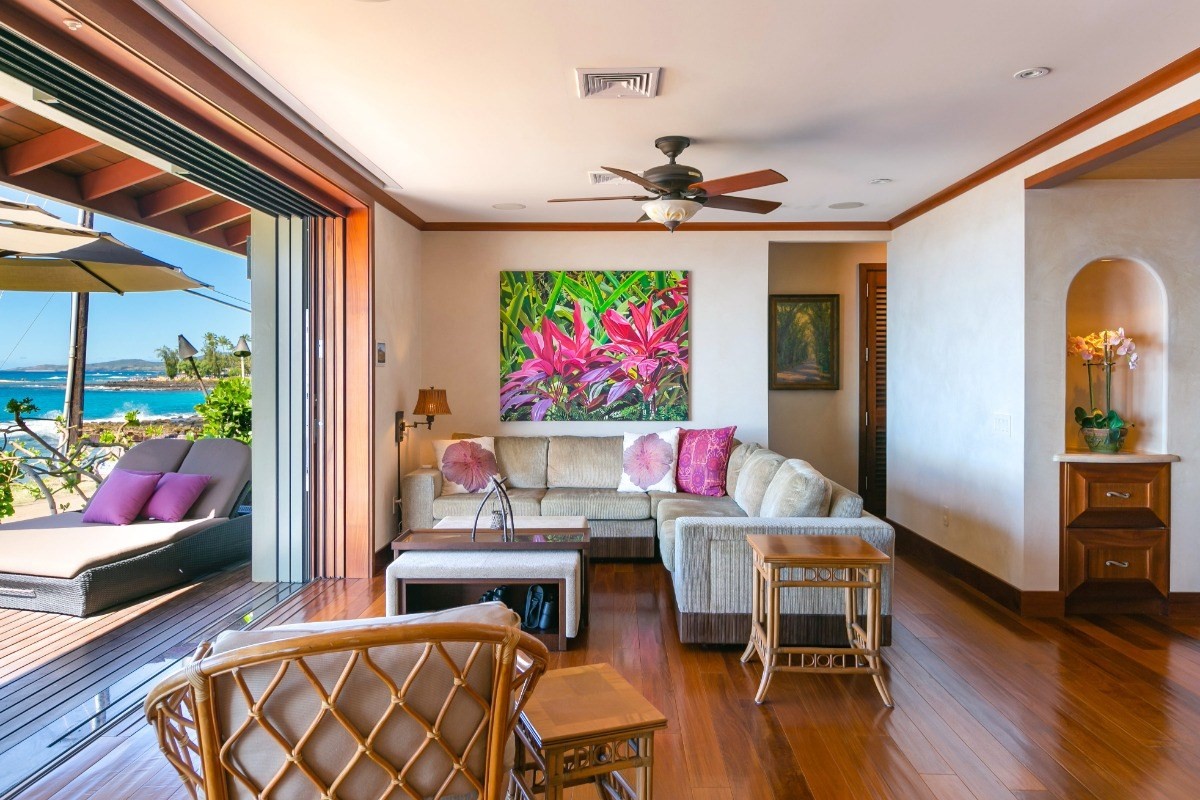1871 Pe'e Road, Unit 1 Koloa, HI 96756 - Photo 11 of 24 a view of a livingroom with furniture and a flat screen tv