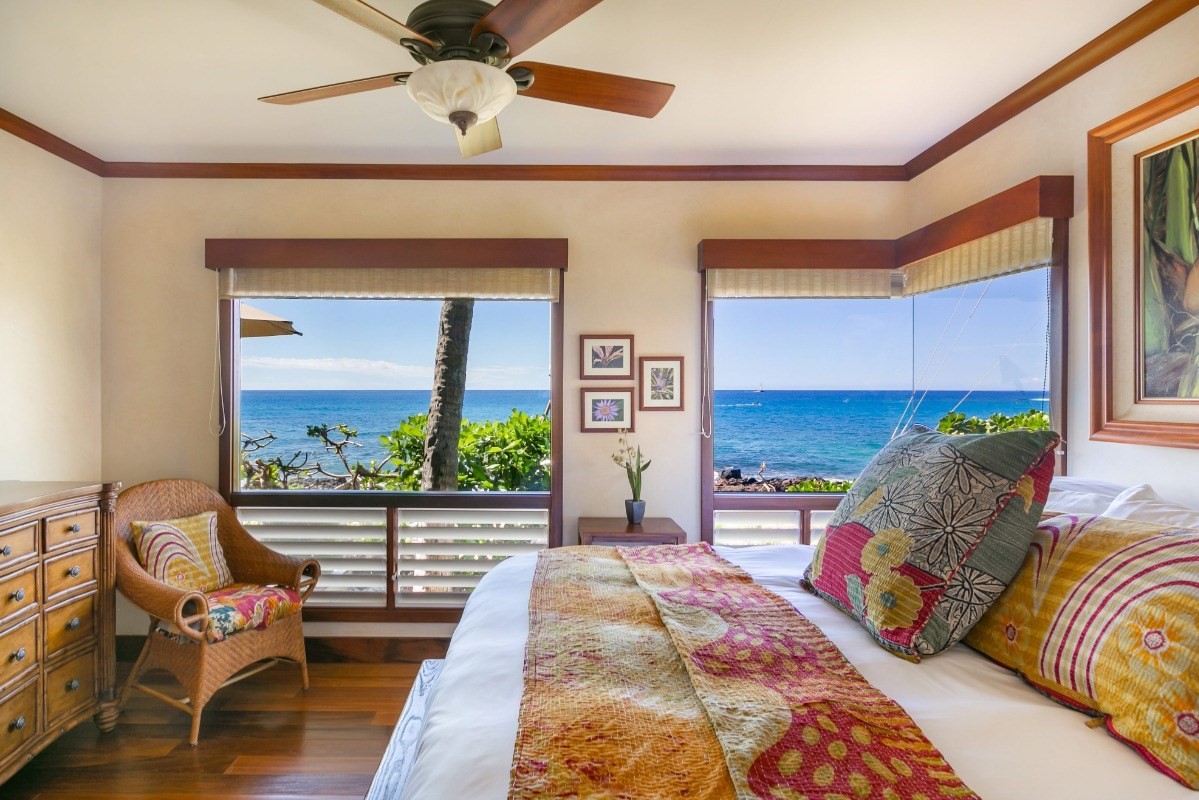 1871 Pe'e Road, Unit 1 Koloa, HI 96756 - Photo 12 of 24 a bed sitting in a bedroom next to a window