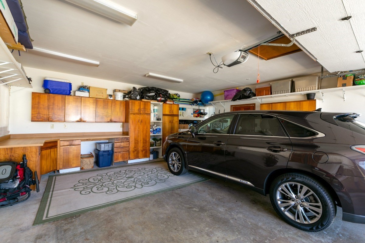 1871 Pe'e Road, Unit 1 Koloa, HI 96756 - Photo 19 of 24 a car parked in garage