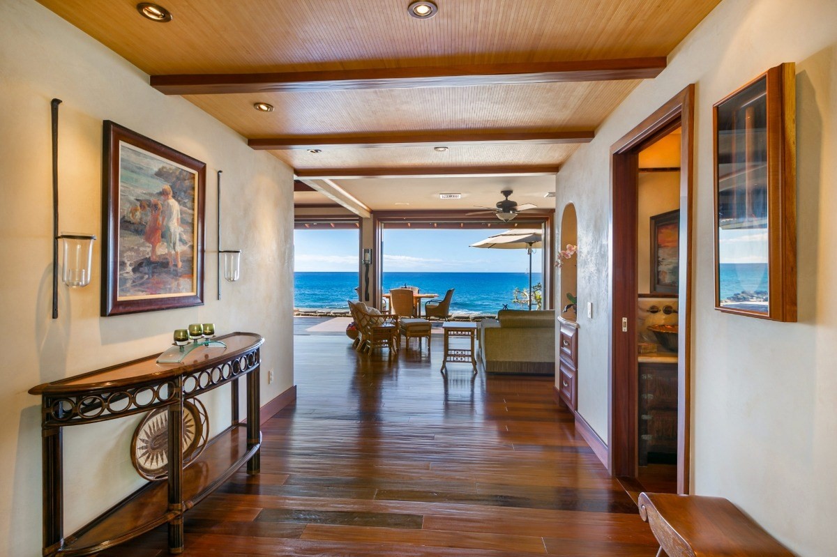 1871 Pe'e Road, Unit 1 Koloa, HI 96756 - Photo 2 of 24 a view of a dining room with furniture window and wooden floor