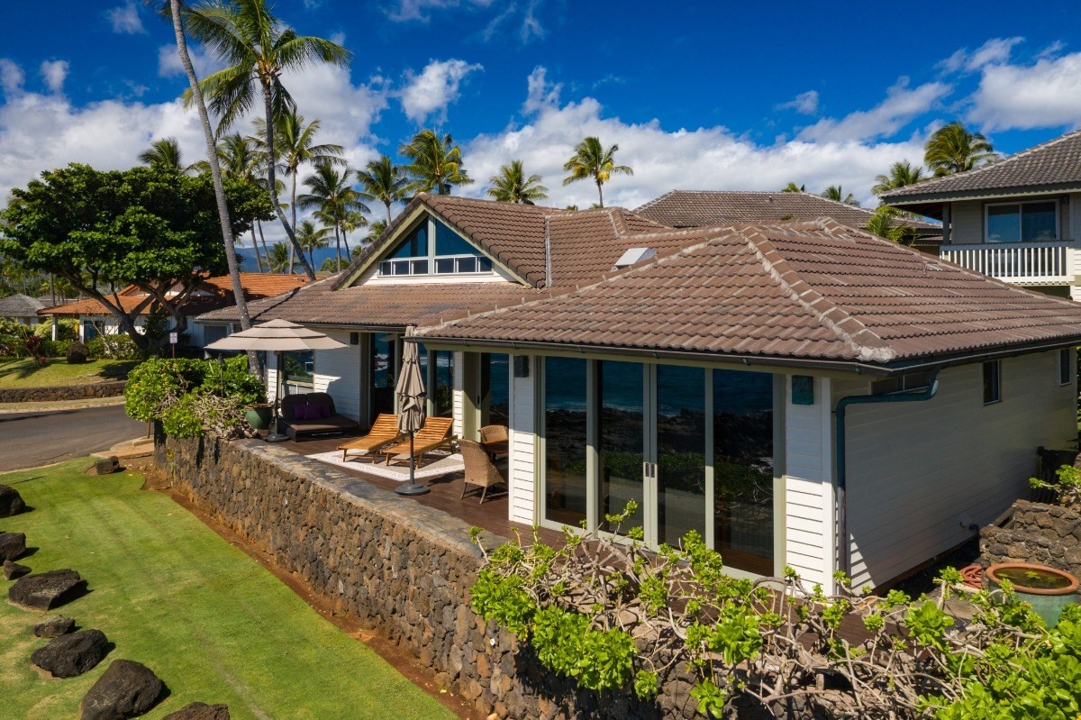 1871 Pe'e Road, Unit 1 Koloa, HI 96756 - Photo 24 of 24 a view of a house with backyard and sitting area