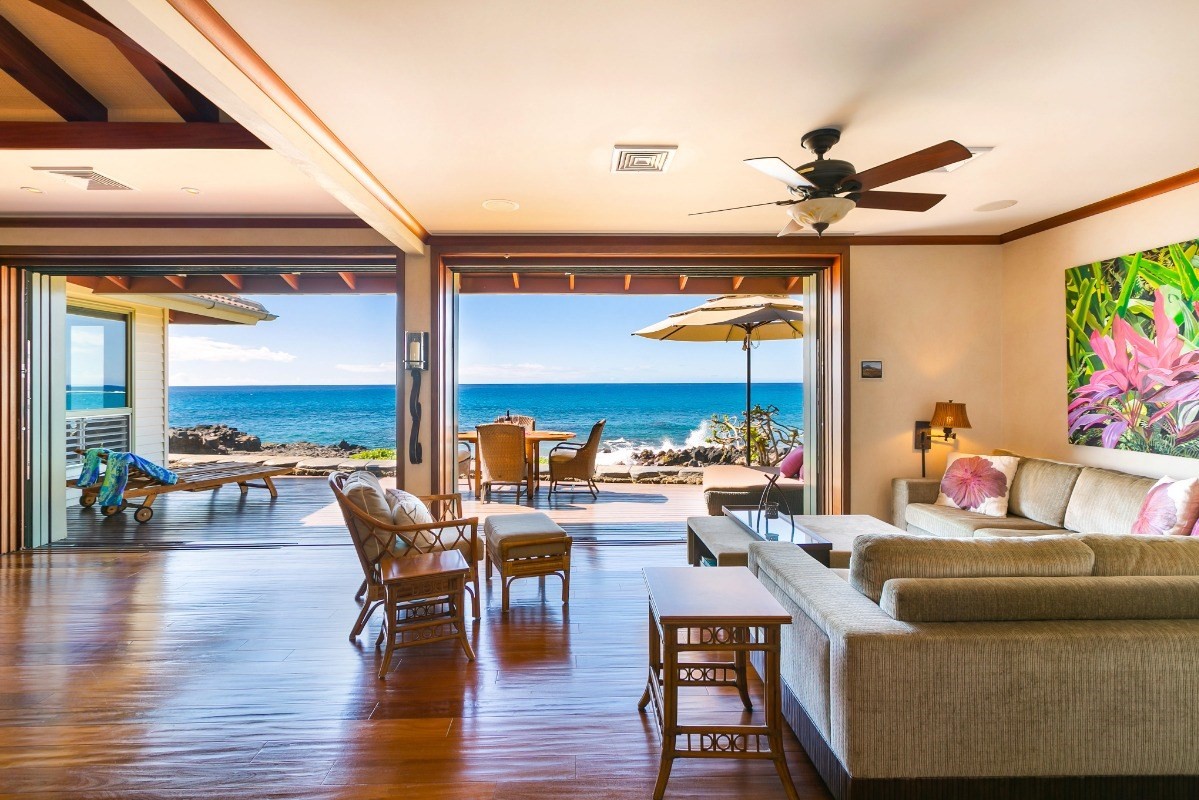 1871 Pe'e Road, Unit 1 Koloa, HI 96756 - Photo 3 of 24 a living room with furniture and a large window