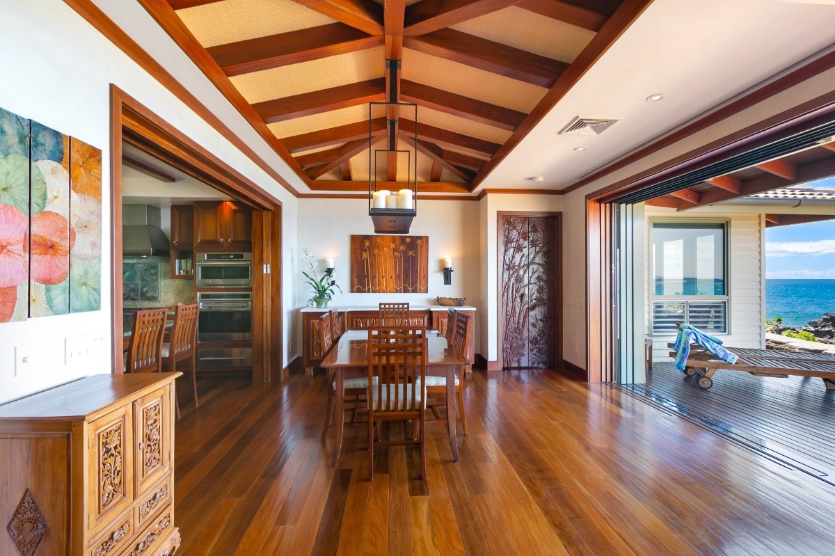 1871 Pe'e Road, Unit 1 Koloa, HI 96756 - Photo 8 of 24 a view of a dining room with furniture window and wooden floor