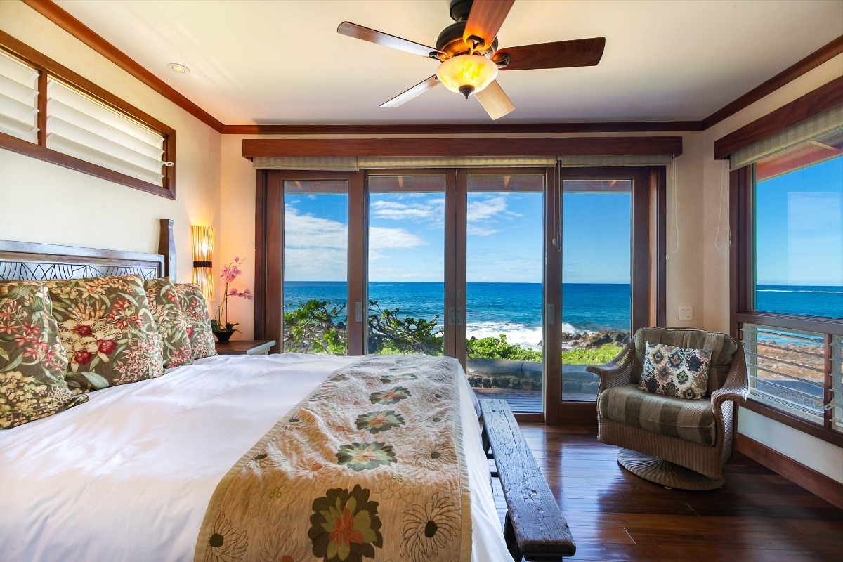 1871 Pe'e Road, Unit 1 Koloa, HI 96756 - Photo 9 of 24 a bedroom with a bed and a couch