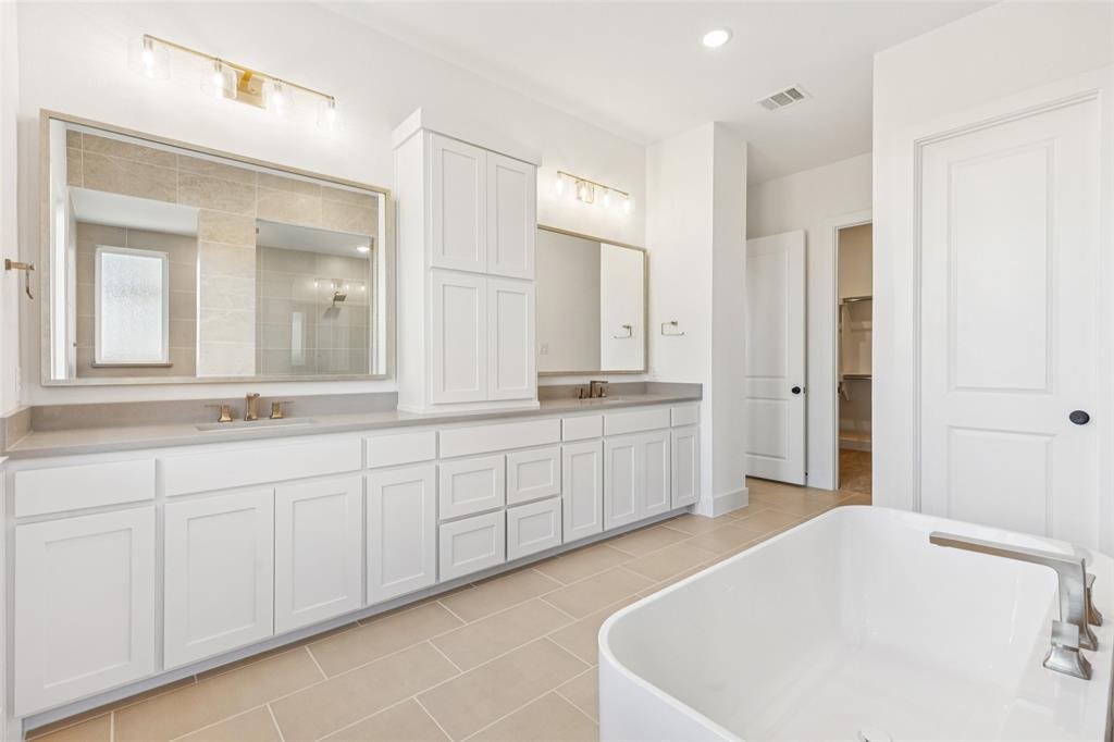 4050 Gambel Road Prosper, TX 75078 - Photo 13 of 23 You'll find outstanding space and style in our Stella owners bath.