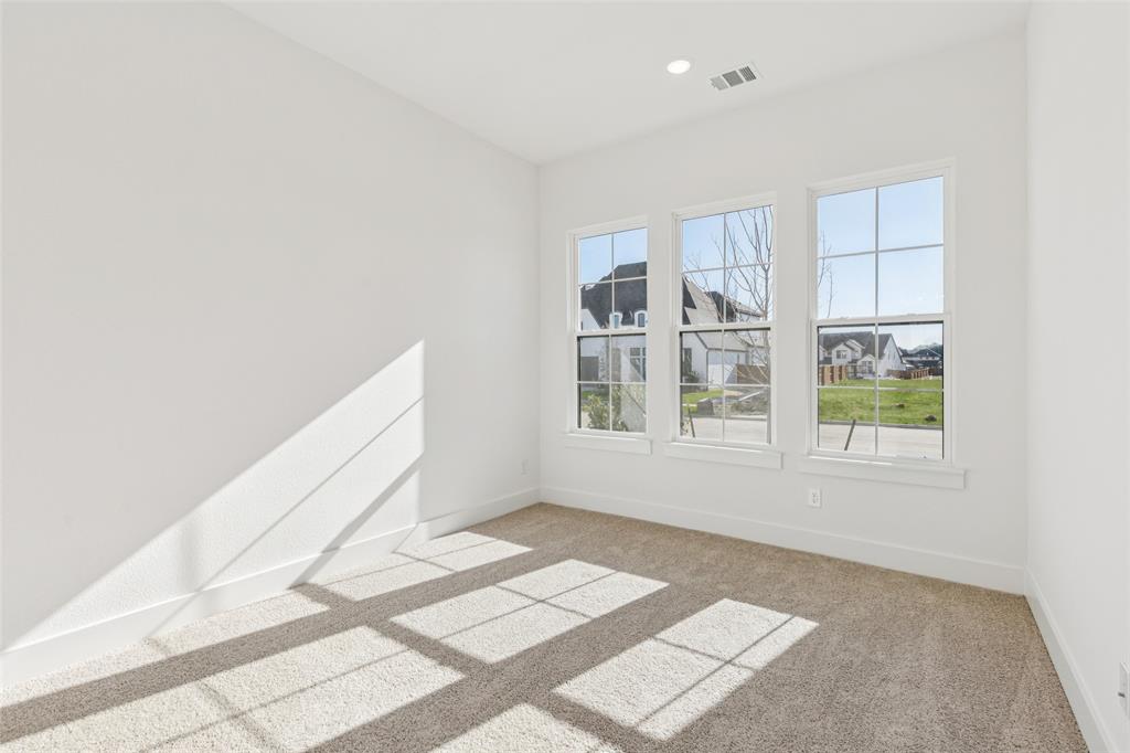 4050 Gambel Road Prosper, TX 75078 - Photo 22 of 23 You'll find nicely sized secondary bedrooms in our Stella floor plan.