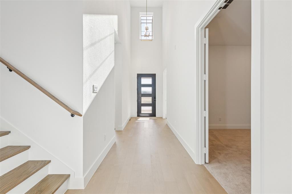 4050 Gambel Road Prosper, TX 75078 - Photo 21 of 23 Open the door to your new dream home and experience an open concept design with beautiful finishes in our Stella floor plan!